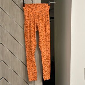 Orange Patterned Leggings with lateral pockets